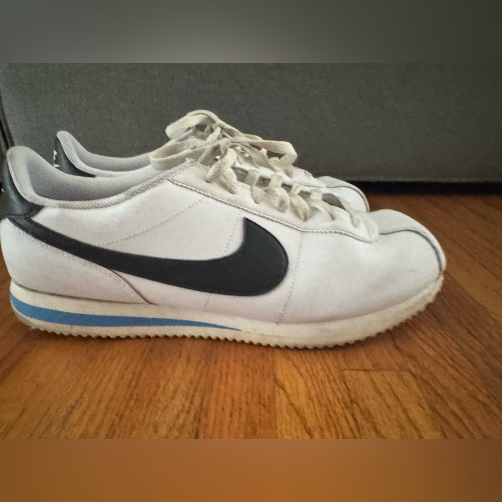 Nike Men’s White Suede Sneakers with Black Swoosh
